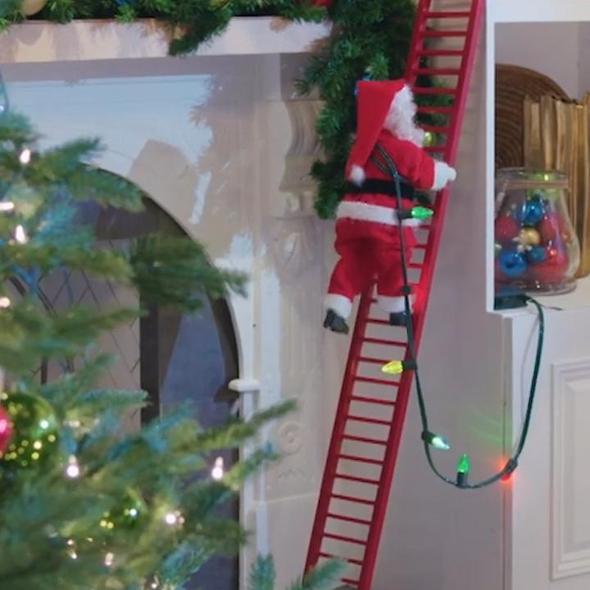 Electric climbing Santa